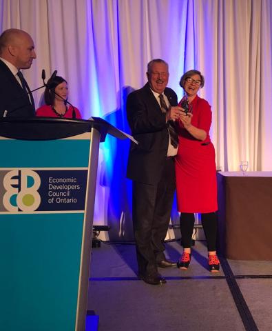 Deputy Warden Alan Barfoot and Local Food Economic Development Officer Philly Markowitz accept an Edco Award